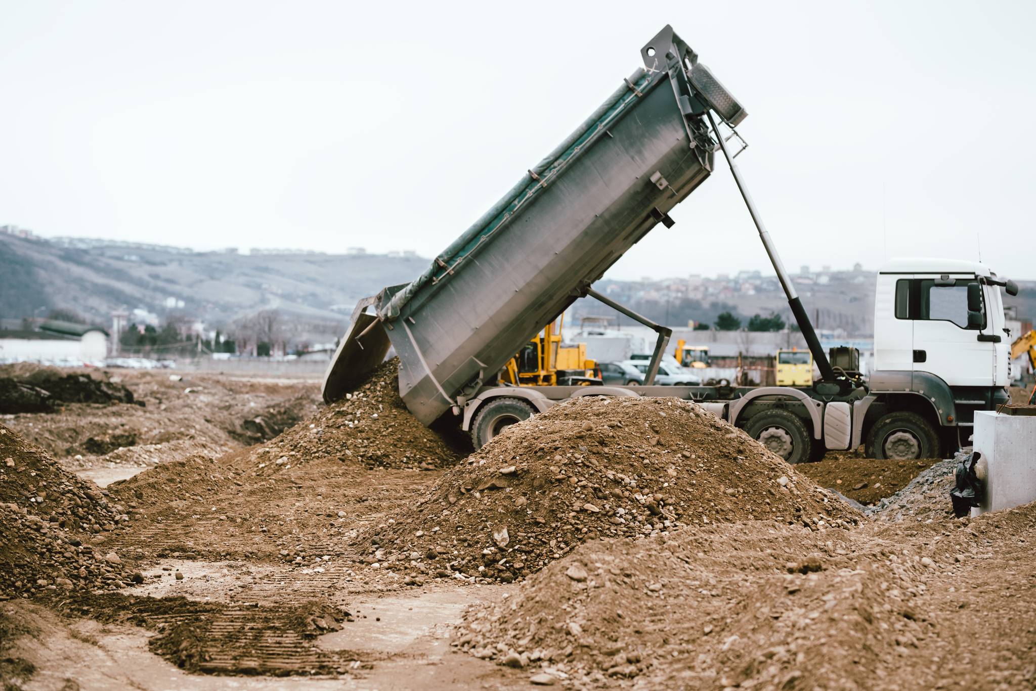Dump truck hauling demolition debris from an Oregon construction site